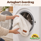 CozyClouds avtagna överdrag läggs i en tvättmaskin