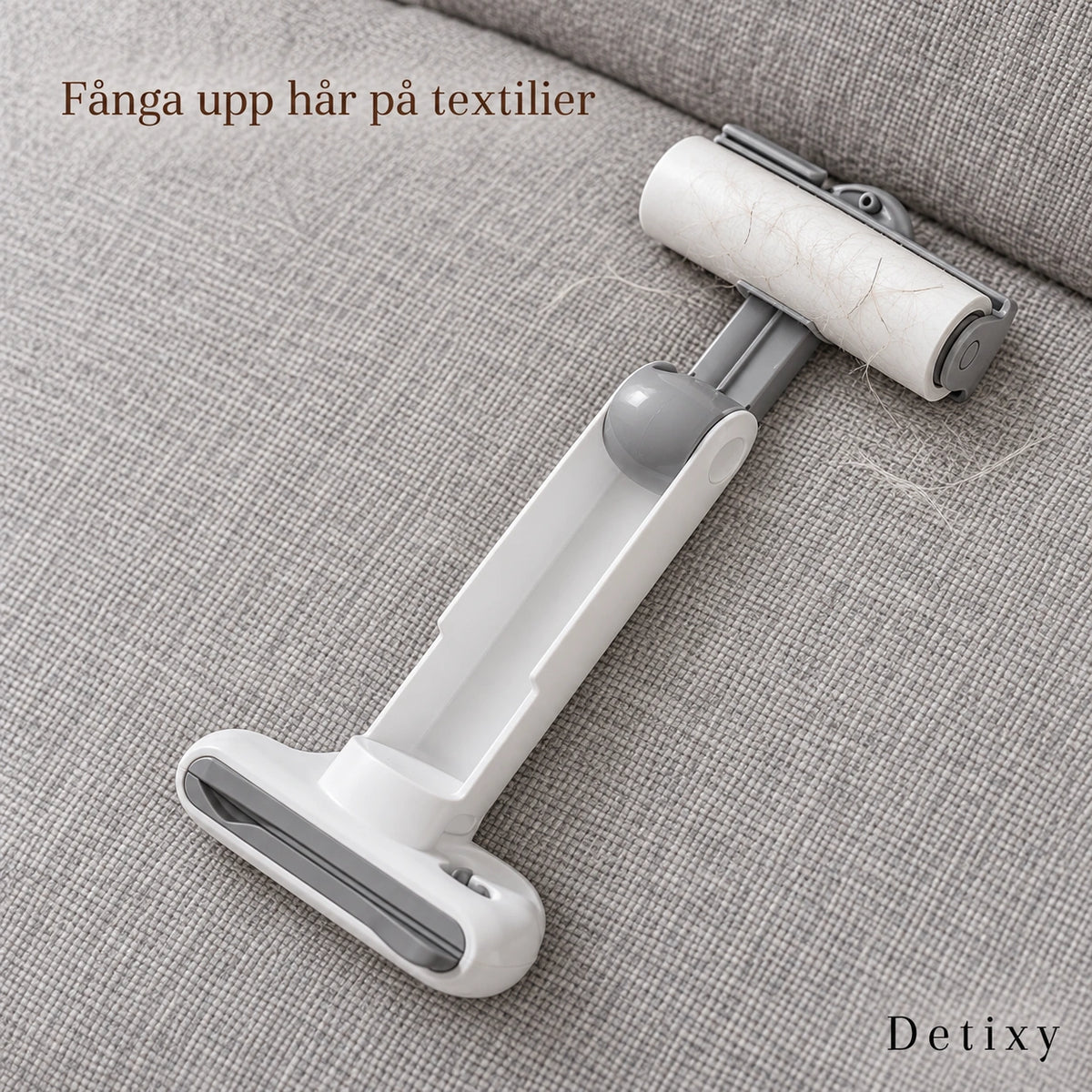 Detixy klädroller i handtaget på en grå soffa
