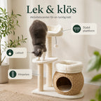 Katt leker vid klöspelaren på PawHut Klösträd med Kattgrotta - Djurslottet